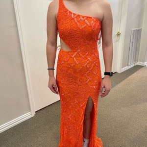NWT and never worn fully beaded orange prom dress